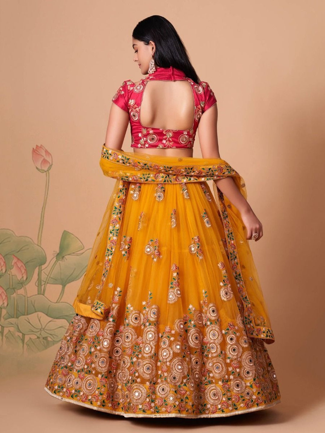 Buy Yellow Soft Net Mirror Work Flowy Modern Haldi Wear Lehenga buy-yellow-soft-net-mirror-work-flowy-modern-haldi-wear-lehenga